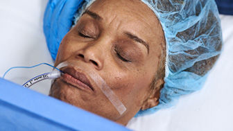 Patient in surgery with a breathing tube