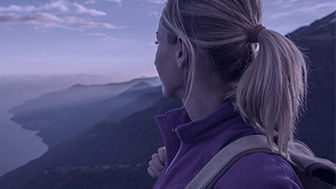 Woman with a ponytail on a mountain