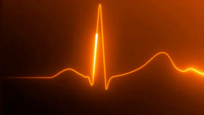 Vital signs displayed with an orange glow for emphasis.