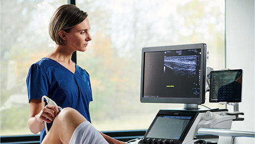 Physician performing an ultrasound