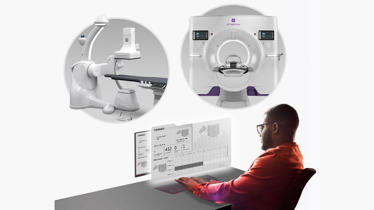 Technician working at a computer on imaging equipment.