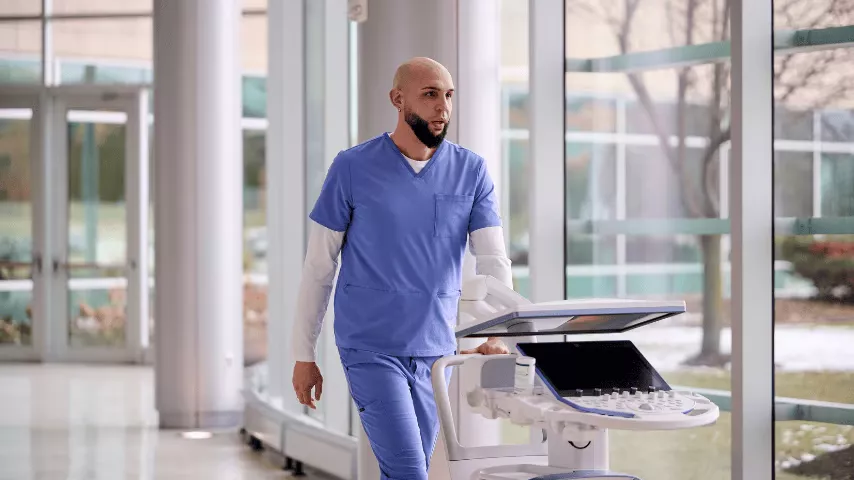 Clinician using an ultrasound on a patient