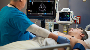 One doctor assessing a patient using Venue in his room