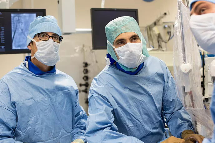 Doctors watching how visipaque reducing patient discomfort