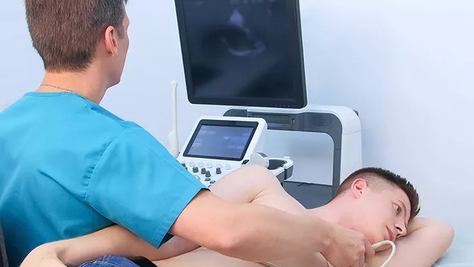 Ultrasound examination on male patient