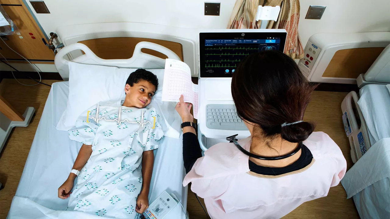 Clinician treating a pediatric patient.