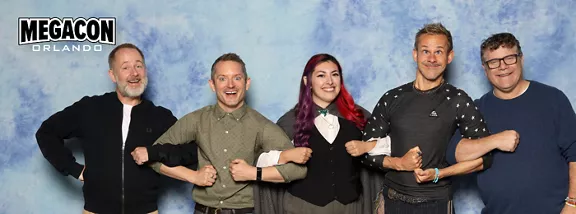 Megacon Orlando photo of fan with Lord of the Rings actors.