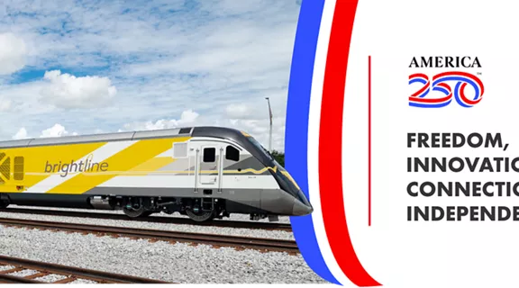A Brightline train with an "America 250" logo and the caption "FREEDOM, INNOVATION, CONNECTION & INDEPENDENCE."