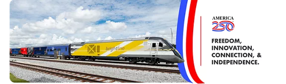 A Brightline train with an America250 commemorative train wrap. 