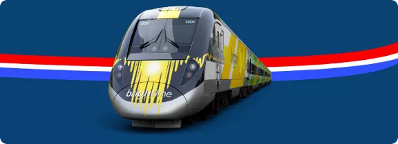 A Brightline train with a patriotic red, white, and blue graphic.