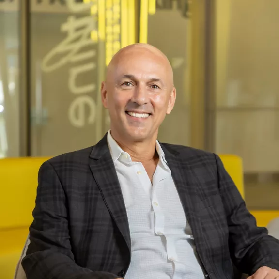 Headshot of Brightline VP, of Guest Experience Andrea Melotti