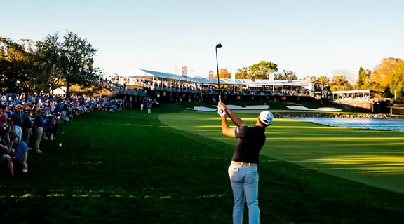 A golfer playing on a course at the Arnold Palmer Invatational