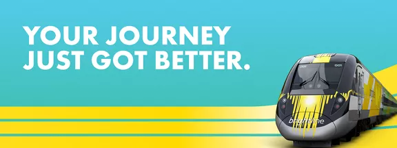 Image of Brightline train on teal and yellow stripe background with the words Your Journey Just Got Better.