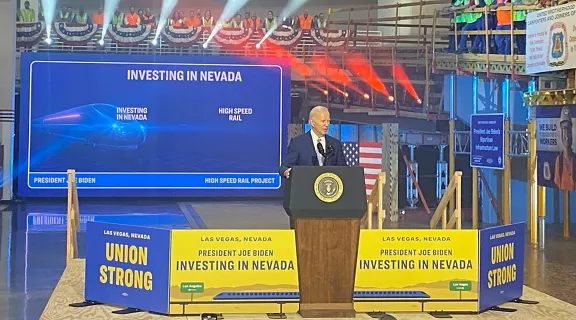 President Joe Biden on stage announcing $3B grant for Nevada Department of Transportation for Brightline West