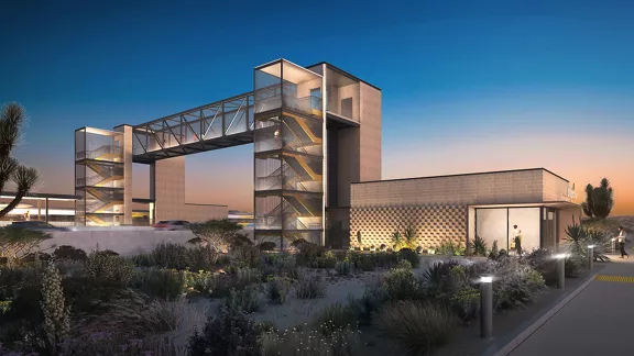 A rendering of the Brightline West Hesperia station at night.