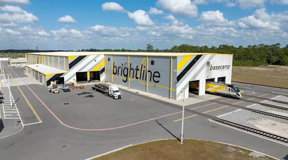 An aerial photograph of a Brightline Vehicle Maintenance Facility.