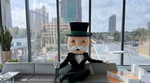 Mr. Monopoly sitting in the local Fort Lauderdale Brightline station