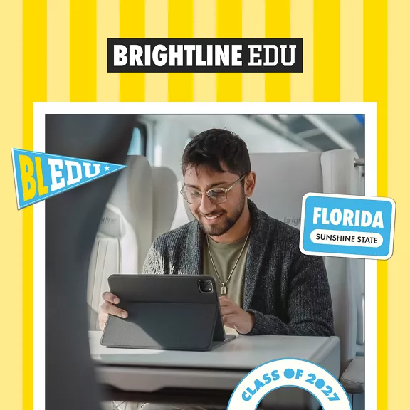 A young man sits on a train seat using a tablet with a keyboard case, focused on his work. The scene is framed by a Brightline EDU design with yellow stripes and educational-themed graphics.