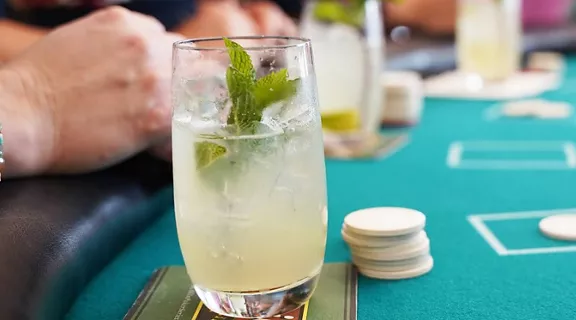 A view of a cocktail drink on a casino game table