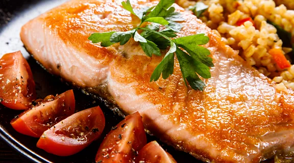 A plate of salmon and rice.