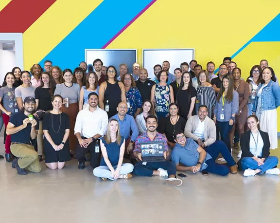 Forty-five Brightline team members, posing for a group photo
