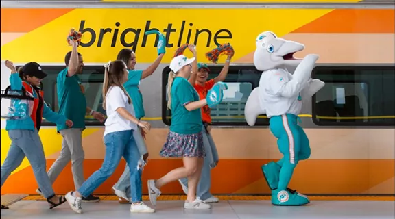 Fans riding the Brightline train to the Miami Dolphins game