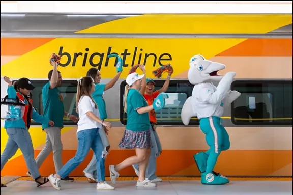 Fans riding the Brightline train to the Miami Dolphins game