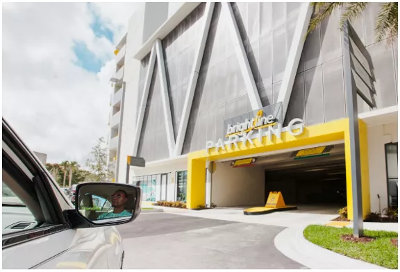 A vehicle entering into a Brightline parking garage.
