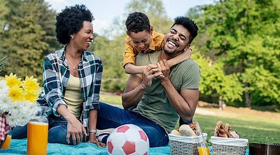 Happy family spending a spring day on picnic