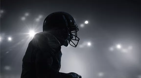 A football player and National Football Championship logo.