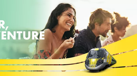 image of train on green background with the words from new year, new adventures and 3 people on the right side of image