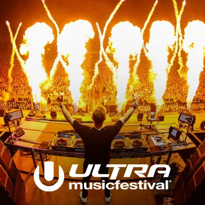 DJ on stage at Ultra Music festival with fireworks
