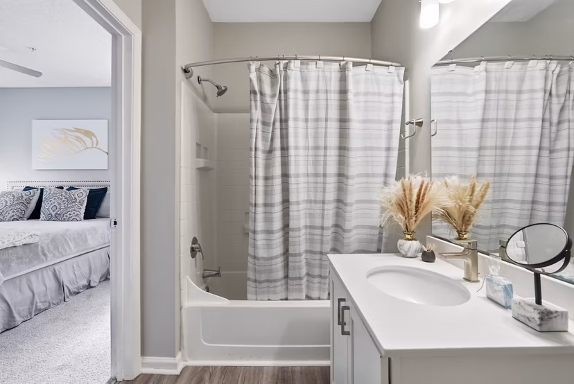 Spacious bathroom with modern design at Avana Long Point Apartments