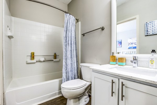 Spacious bathroom with modern design at Avana Long Point Apartments
