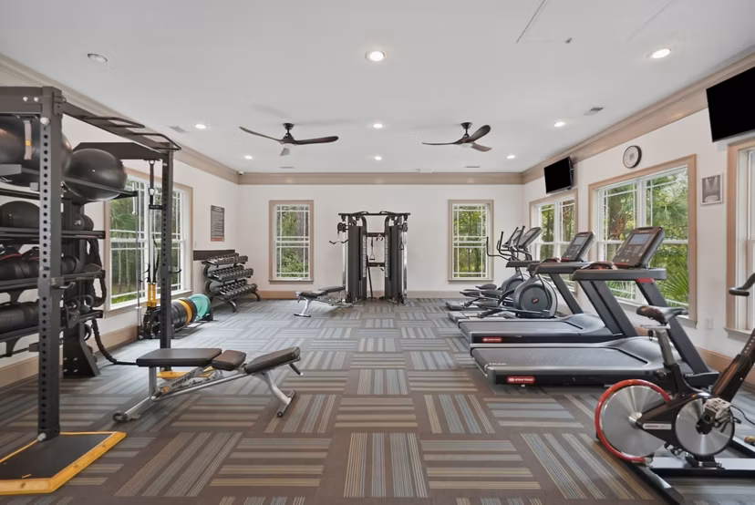 Modern fitness center with state-of-the-art equipment at Avana Long Point Apartments
