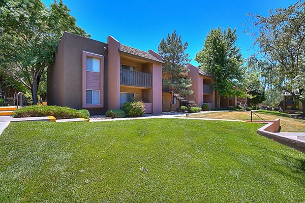 Eagle Point Apartments: Luxurious view of modern apartment building in a tranquil setting