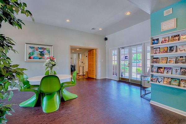 Clubhouse featuring modern design and communal seating at Eagle Point Apartments
