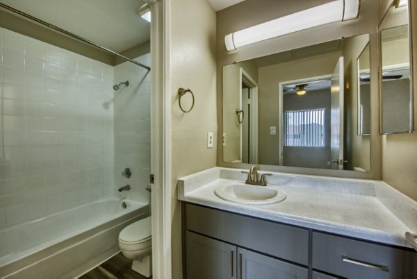 Stylish bathroom with modern fixtures at Avana Tempe Apartments, offering luxury living in a tranquil setting