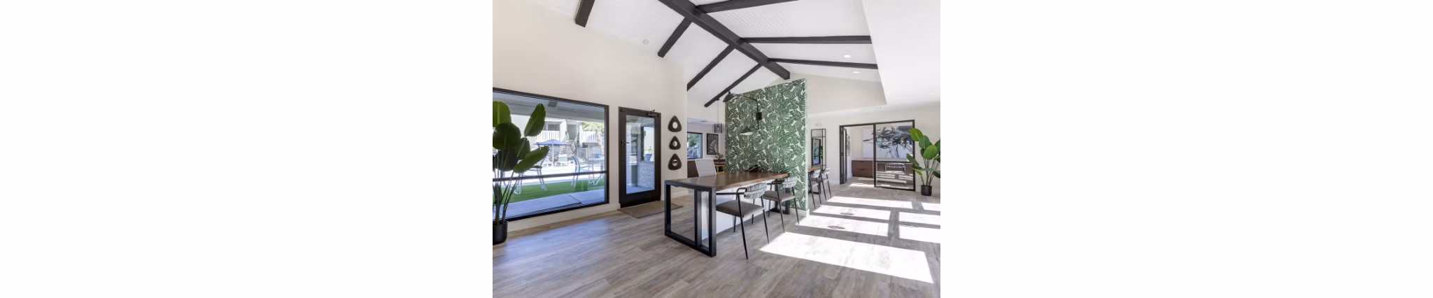 Clubhouse lobby featuring contemporary design and seating at Avana Tempe Apartments