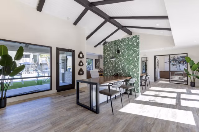 Clubhouse lobby featuring contemporary design and seating at Avana Tempe Apartments