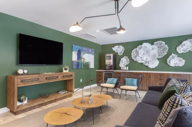 Theater room with plush seating at Avana Tempe Apartments offering a luxury experience