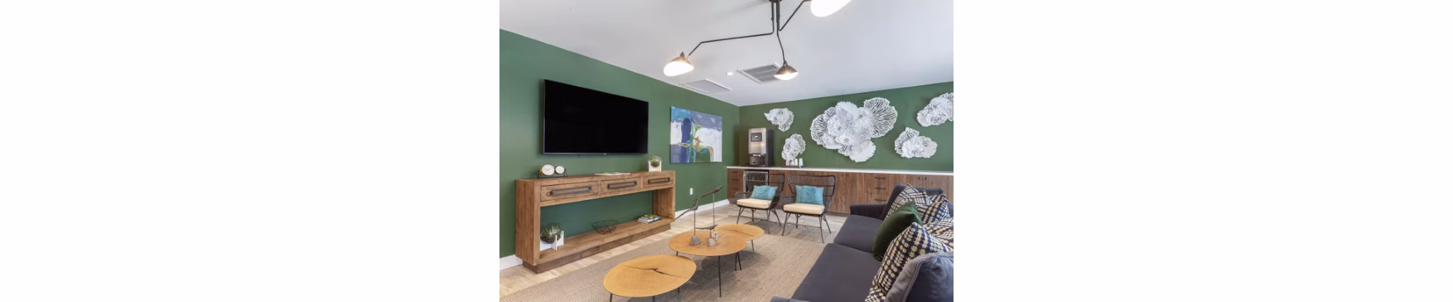 Theater room with plush seating at Avana Tempe Apartments offering a luxury experience