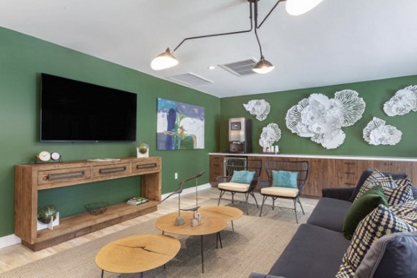 Theater room with plush seating at Avana Tempe Apartments offering a luxury experience