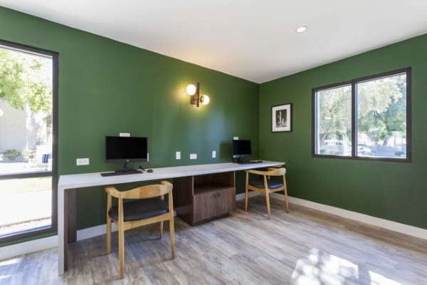 Modern business center with workstations and conference facilities at Avana Tempe Apartments