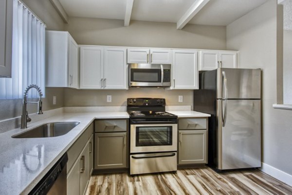 Modern kitchen with stainless steel appliances at Avana Tempe Apartments