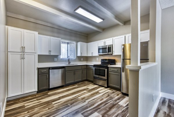 Modern kitchen with stainless steel appliances at Avana Tempe Apartments