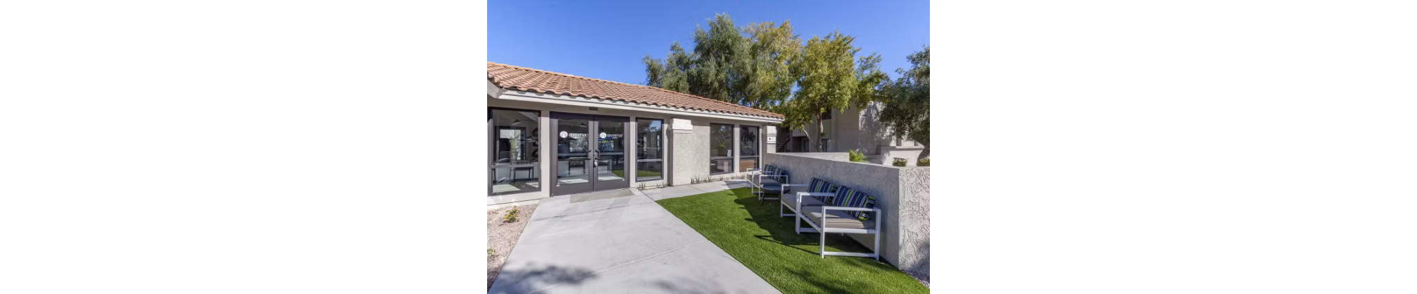 Clubhouse with modern design and cozy seating at Avana Tempe Apartments, ideal for socializing and relaxation