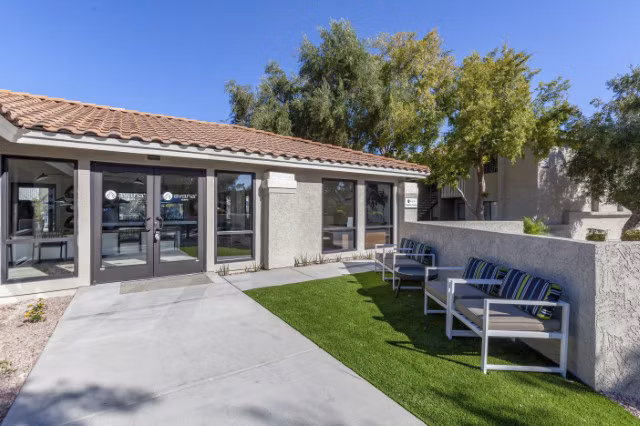 Clubhouse with modern design and cozy seating at Avana Tempe Apartments, ideal for socializing and relaxation