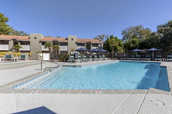 Resort-style pool with lounge seating at Avana Tempe Apartments, offering luxury living in a vibrant community setting