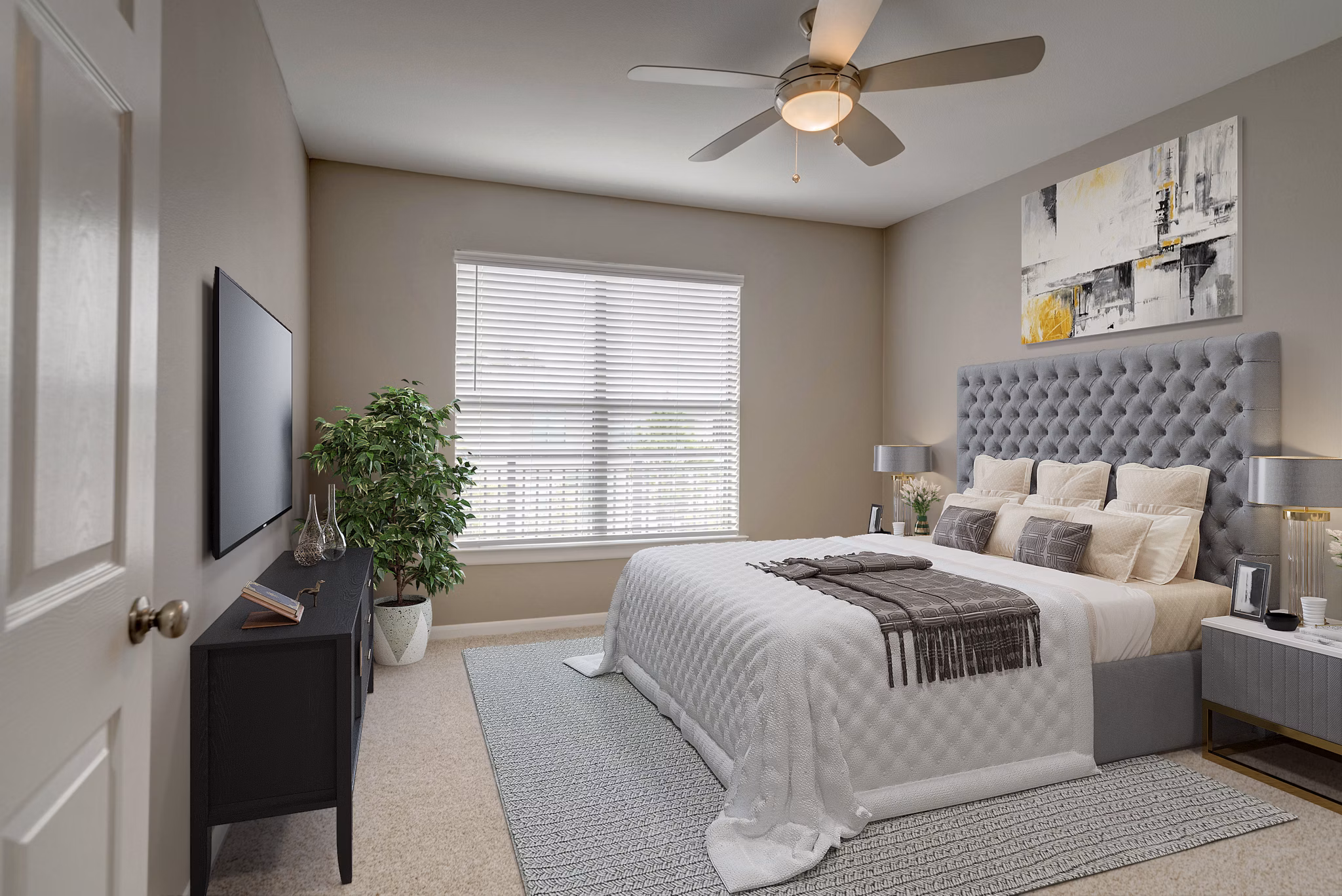 Elegant bedroom with chic decor and ample natural light in Boardwalk at Town Center Apartments